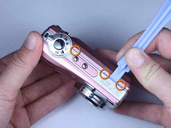 Disassembling Kodak Easyshare C813 Back Cover: step 7, image 2 of 3