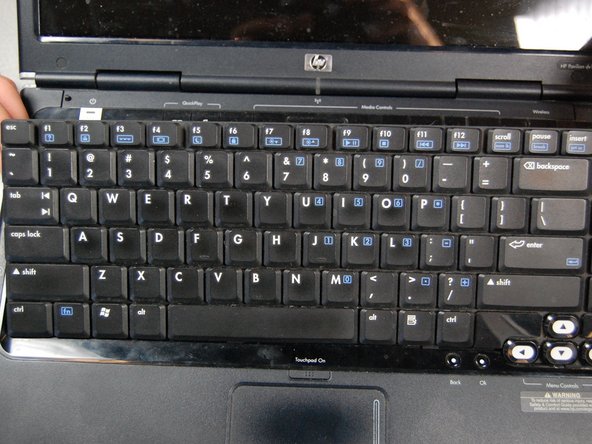 HP Pavilion dv1000 Back Cover Replacement: step 18, image 1 of 3