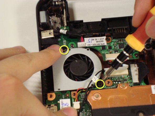 Disassembling Compaq Mini 110 Fan: step 14, image 1 of 2