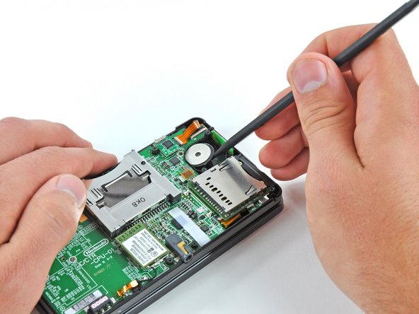 Nintendo 3DS Power Button Replacement: step 9, image 1 of 2