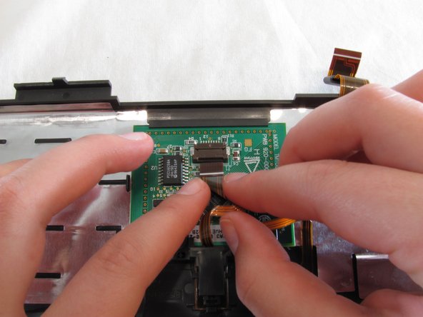 PowerBook 3400 M3553 Track Pad Replacement: step 10, image 2 of 3