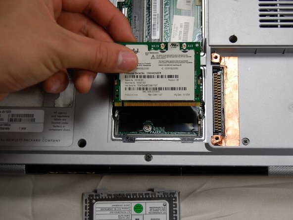 HP Pavilion dv1000 Back Cover Replacement: step 16, image 3 of 3
