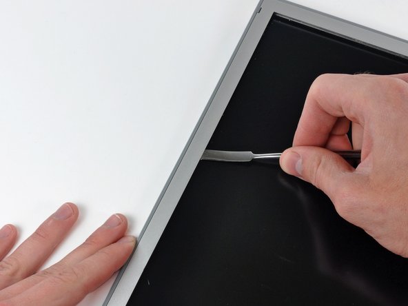 PowerBook G4 Aluminum 17" 1.67 GHz (High-Res) Front Display Bezel Replacement: step 54, image 3 of 3