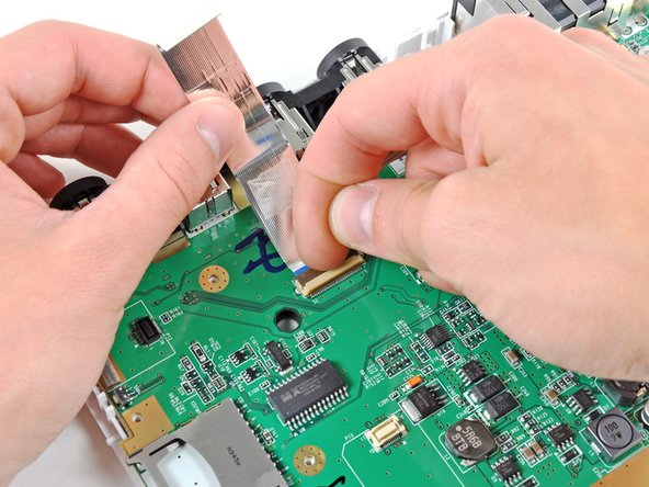 Nintendo Wii Motherboard Replacement: step 39, image 1 of 2