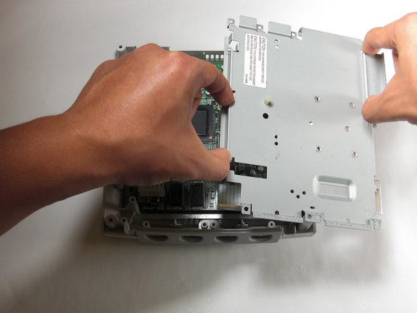 Sega Dreamcast Logic Board Removal: step 21, image 2 of 3