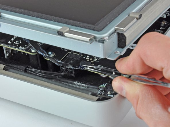 iMac Intel 27" EMC 2309 and 2374 AirPort Card Replacement: step 5, image 1 of 2