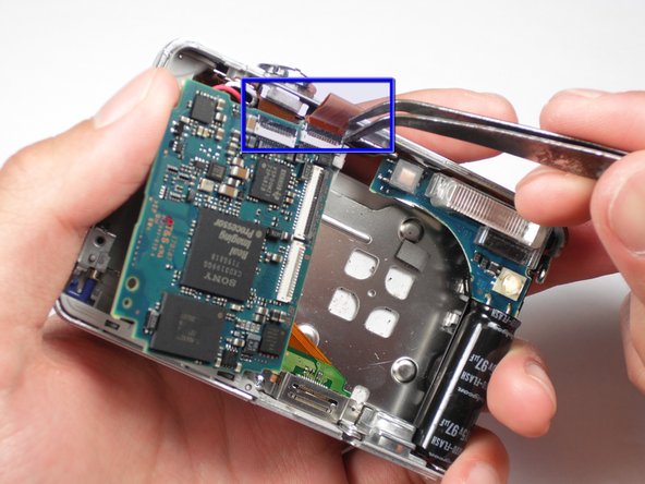 Sony Cyber-shot DSC-W55 Motherboard - First Half Replacement: step 12, image 1 of 2