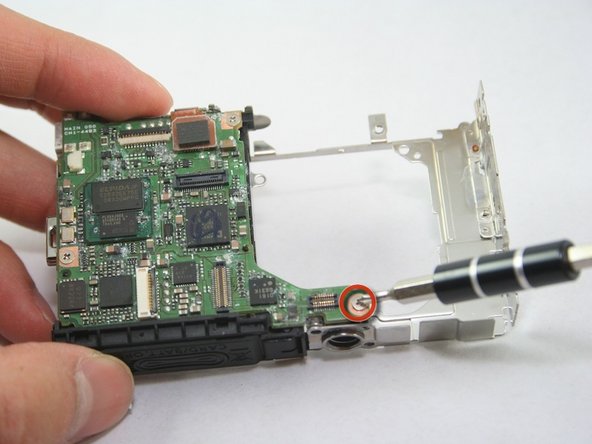 Disassembling Canon PowerShot SD1100 IS AV port and Logic board: step 22, image 1 of 2