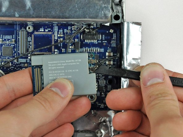 iMac G5 20" Model A1145 Speakers Replacement: step 19, image 1 of 2