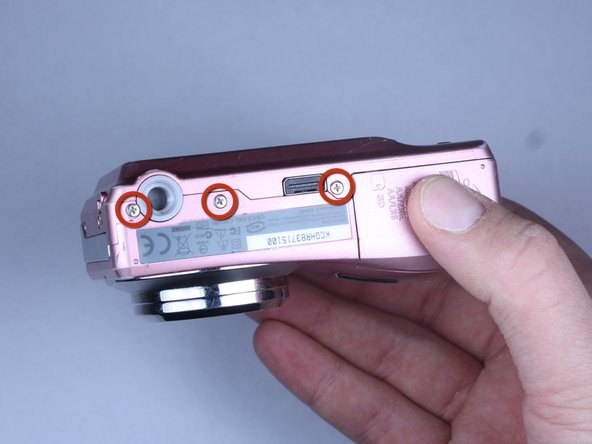 Disassembling Kodak Easyshare C813 Front Cover: step 5, image 1 of 3