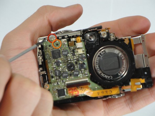 Disassembling Canon PowerShot SD800 IS Lens Assembly: step 16, image 1 of 1