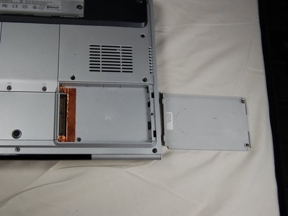 HP Pavilion dv1000 Back Cover Replacement: step 7, image 1 of 1