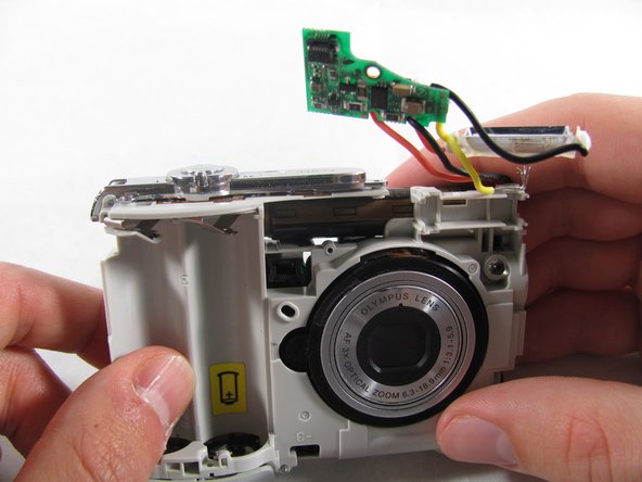 Removing Olympus FE-210 Flash Assembly: step 10, image 3 of 3