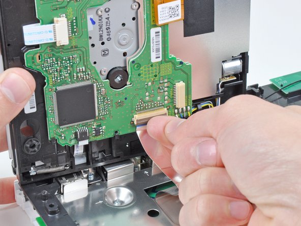 Nintendo Wii Bottom Panel Replacement: step 22, image 1 of 2