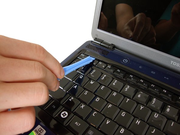 Toshiba Satellite M305D-S4829 Keyboard Replacement: step 4, image 1 of 2