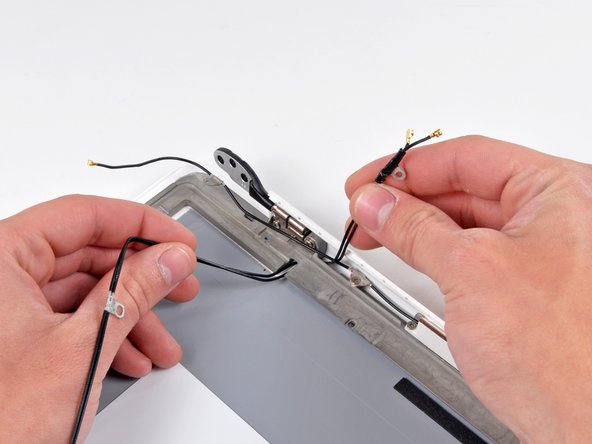 MacBook Unibody Model A1342 Antenna Cables Replacement: step 31, image 1 of 1