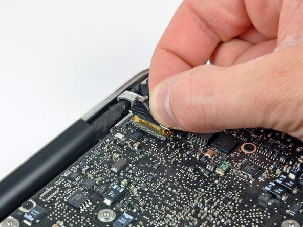 MacBook Pro 13" Unibody Mid 2010 AirPort Antenna Replacement: step 8, image 1 of 3