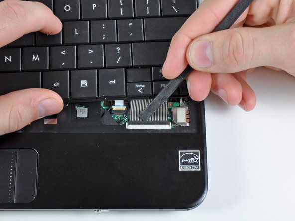 HP Mini 1000 Left Display Hinge Replacement: step 6, image 1 of 1