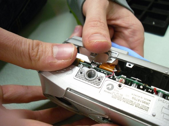 Olympus Camedia D560 Rear Panel Control Buttons Replacement: step 3, image 2 of 3