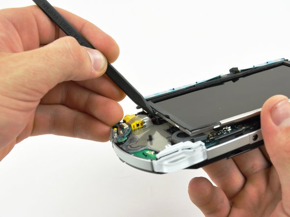 PSP 300xc UMD Door Replacement: step 9, image 1 of 1