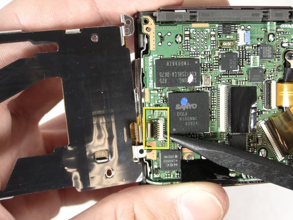 Nikon Coolpix S210 Circuit Board Cover Replacement: step 10, image 2 of 2