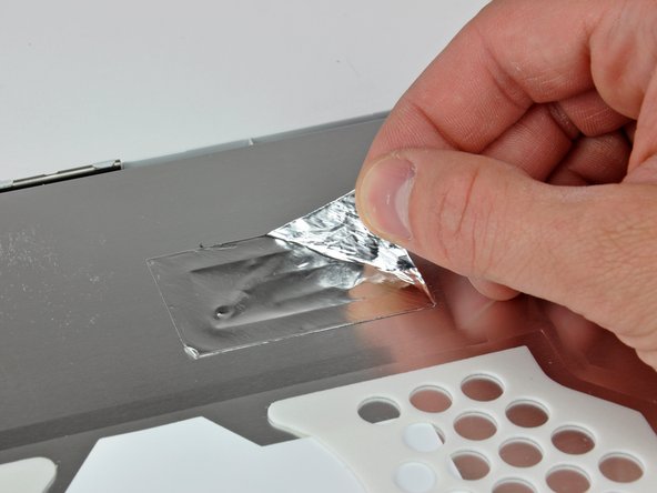 iBook G4 12" 800 MHz-1.2 GHz Front Display Bezel Replacement: step 53, image 1 of 2