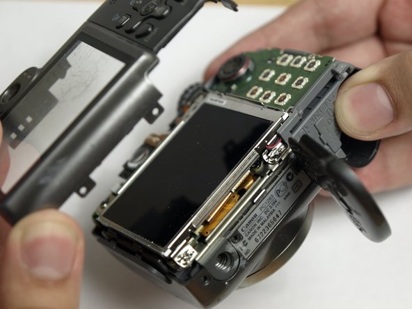 Disassembling Canon PowerShot A590 IS Front Cover, Remove Back Cover: step 7, image 1 of 1