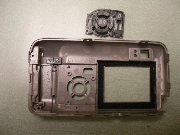 Olympus Camedia D560 Rear Panel Control Buttons Replacement: step 5, image 1 of 3