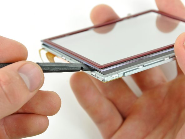 Nintendo DSi XL Touchscreen Replacement: step 24, image 1 of 2