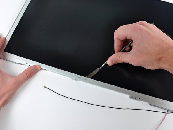 PowerBook G4 Aluminum 17" 1-1.67 GHz Front Display Bezel Replacement: step 48, image 2 of 3