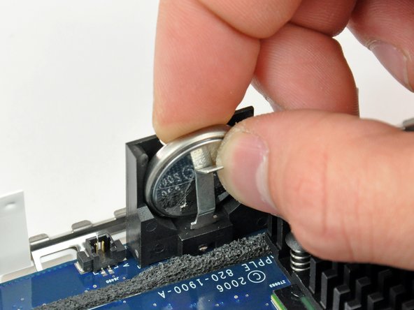 Mac mini Model A1176 PRAM Battery Replacement: step 15, image 1 of 2