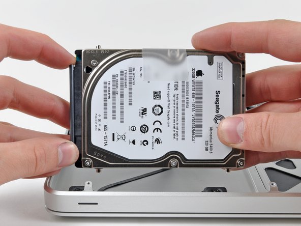 MacBook Pro 15" Unibody Mid 2010 Hard Drive/IR Sensor Cable Replacement: step 10, image 1 of 2