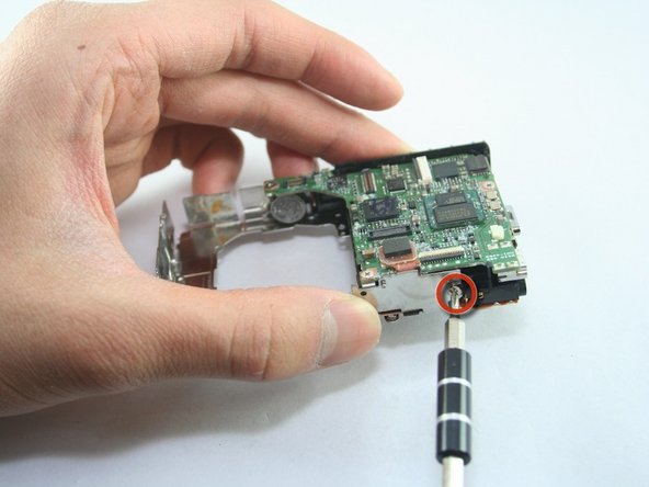 Disassembling Canon PowerShot SD1100 IS AV port and Logic board: step 21, image 1 of 2