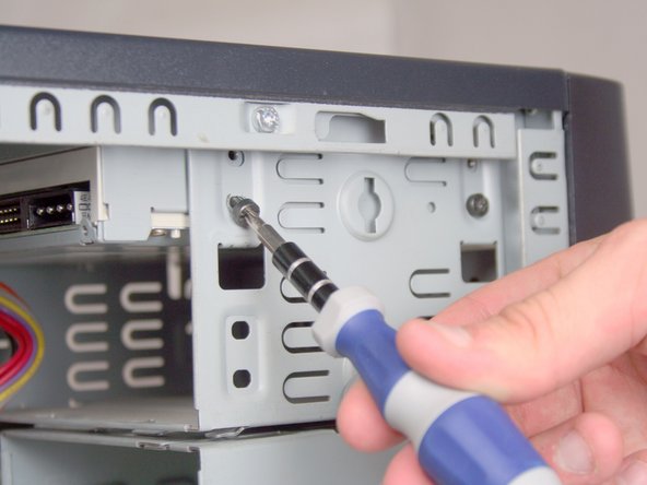 Removing the HP Compaq dx2000MT Optical (CD) Drive: step 6, image 2 of 2