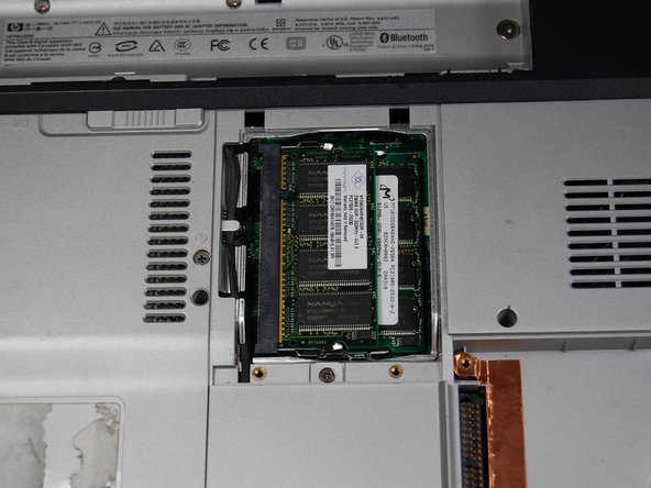 HP Pavilion dv1000 Back Cover Replacement: step 10, image 2 of 2