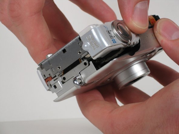 Canon PowerShot SD200 Buttons Replacement: step 8, image 1 of 2