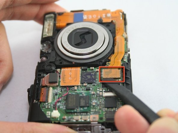 Disassembling Canon PowerShot SD1100 IS AV port and Logic board: step 12, image 1 of 2