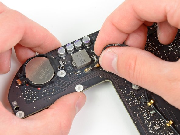 Mac Mini Mid 2011 I/O Bezel Replacement: step 22, image 2 of 2