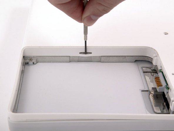 iBook G4 14" 933 MHz-1.33 GHz I/O Bezel Replacement: step 16, image 1 of 1