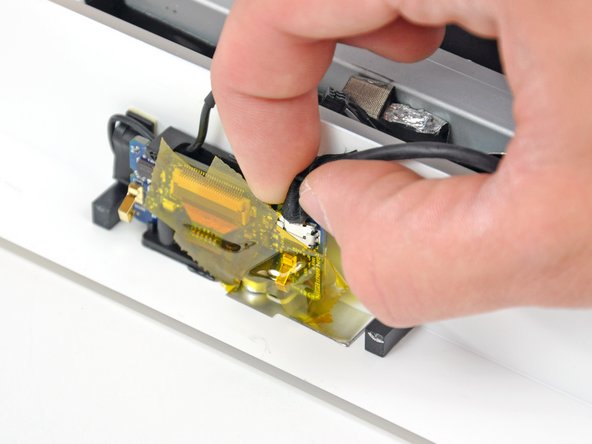 iMac Intel 20" EMC 2105 and 2118 Camera Lens Replacement: step 7, image 2 of 3