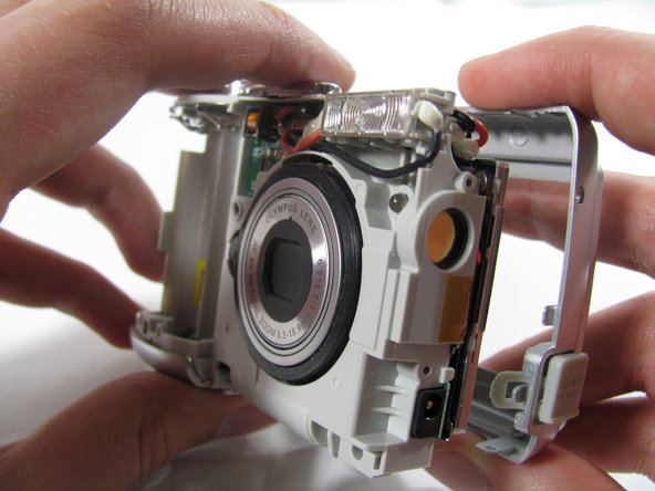Removing Olympus FE-210 Flash Assembly: step 6, image 1 of 3