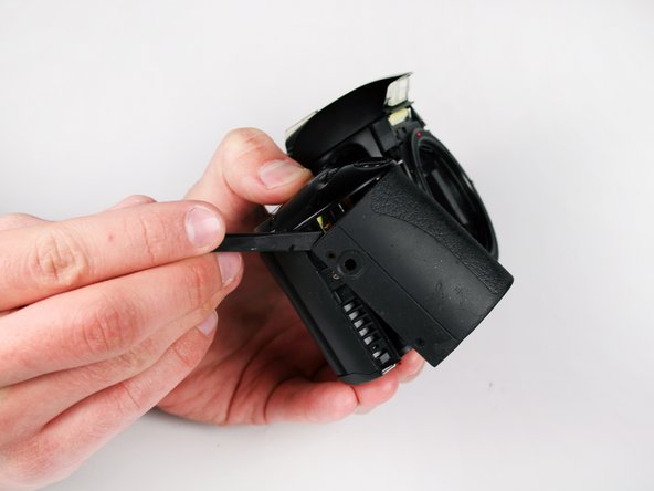 Disassembling Canon EOS Rebel XS Battery Door: step 8, image 3 of 3