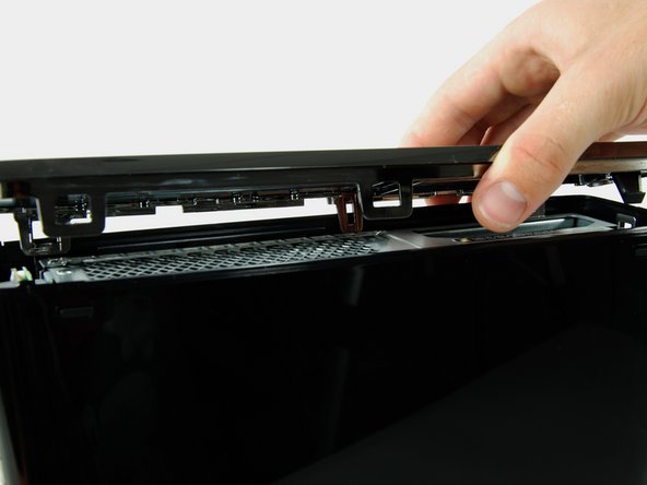 Xbox 360 S Faceplate Replacement: step 23, image 2 of 2