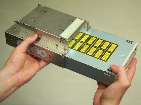 Disassembling Power Mac G4 M5183 DVD-ROM Drive: step 5, image 3 of 3