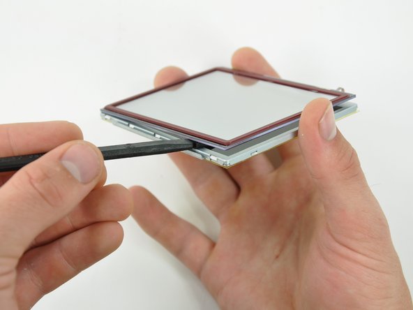 Nintendo DSi XL Touchscreen Replacement: step 23, image 1 of 2