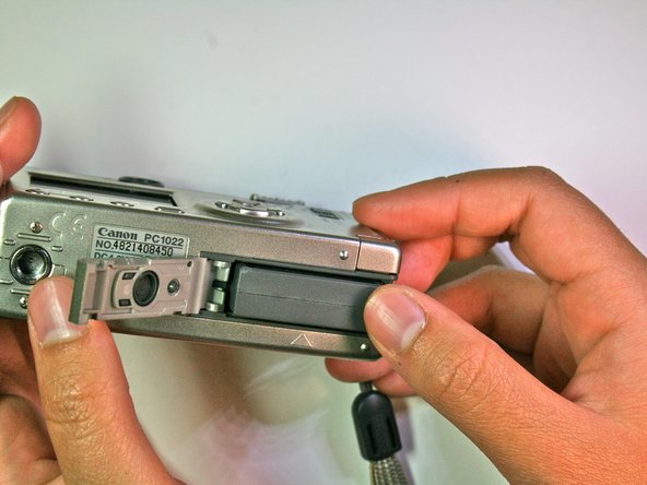 Canon Powershot S200 Camera lens Replacement: step 2, image 2 of 2