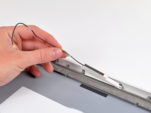 MacBook Unibody Model A1342 Rear Display Bezel Replacement: step 36, image 1 of 1