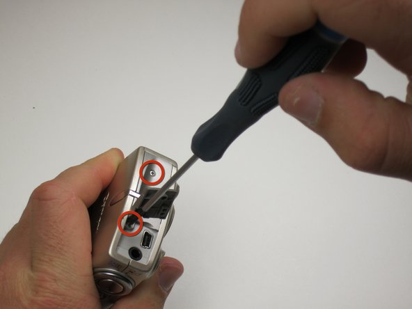 Canon Powershot SD550 Shutter Button Replacement: step 3, image 1 of 3