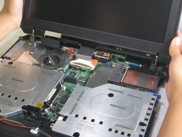 Disassembling IBM ThinkPad A30 Speakers: step 13, image 1 of 3