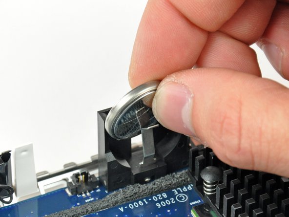 Mac mini Model A1176 PRAM Battery Replacement: step 15, image 2 of 2